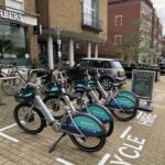 Four e-bikes for hire outside Guildford library