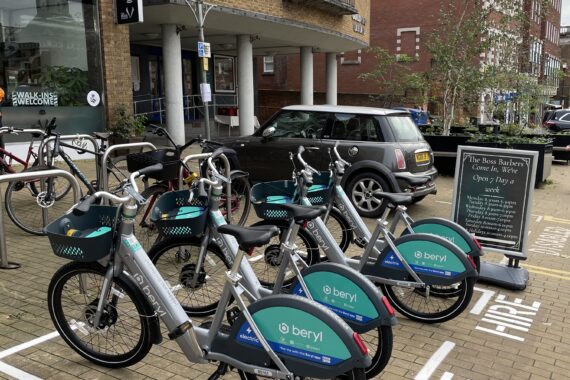 Four e-bikes for hire outside Guildford library